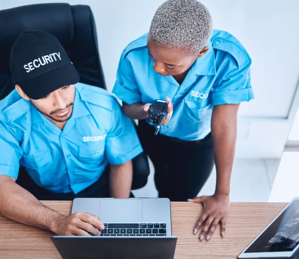 security-guard-laptop-and-police-team-watching-su-2025-04-06-10-16-19-utc
